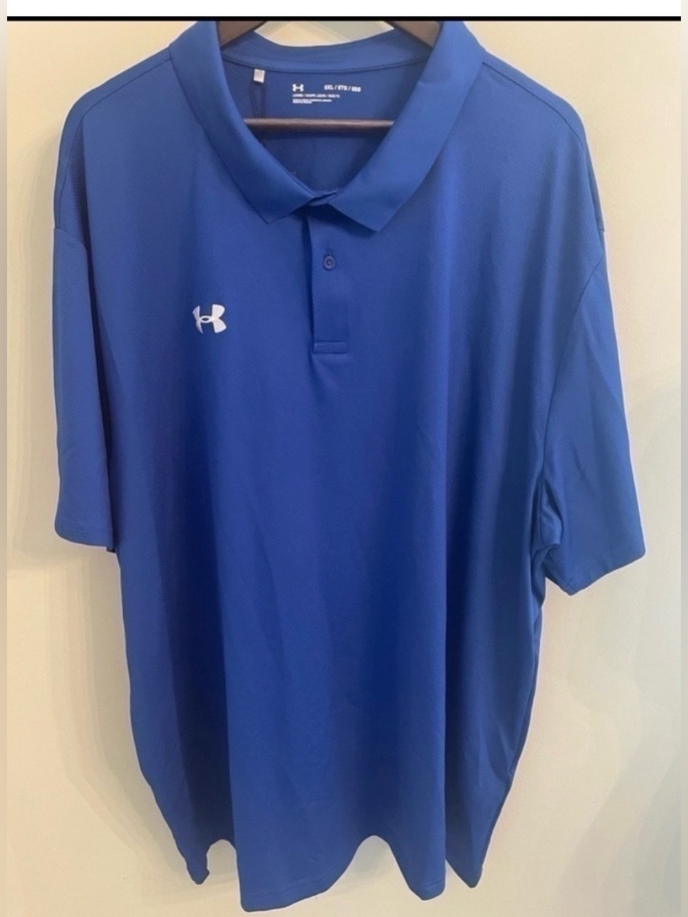NWT Under Armour Blue Polo.
Size 5X